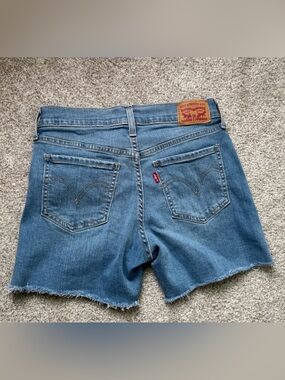 Levi's Medium Wash Frayed Hem Denim Shorts